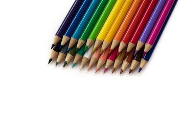 Colored pencils isolated on white background