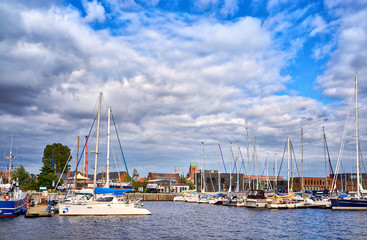 Fototapeta na wymiar Harbor in Wismar with sailing boats.