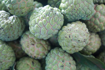 Obraz premium Annona fruit Red for sale in the bazaar