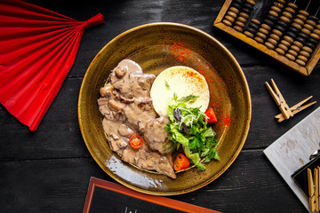 Stewed beef with mushrooms and mashed potato
