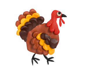 Fun cartoon Thanksgiving turkey. Plasticine kids artwork.