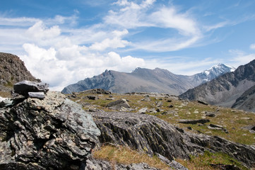 Rocky plateau in the Valley of the Seven Lakes with Altai mountains in the background, Russian Federation