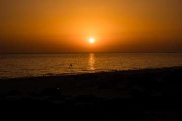 Sunset at La Barrosa beach in Sancti Petri, Cadiz, Spain