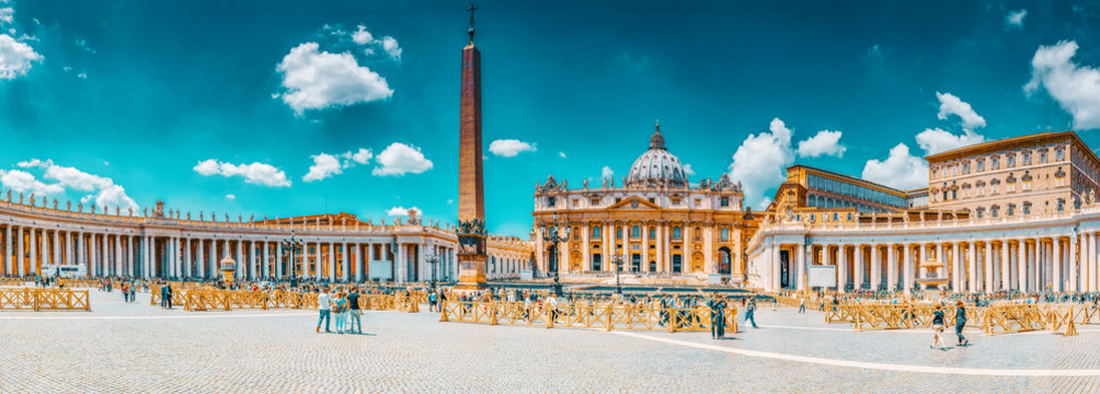 VITACAN-CITY, VATICAN- MAY 09, 2017 : St. Peter's Square and St. Peter's Basilica, Vatican City in the day time, tourist around. Italy.
