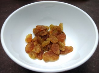 A raisin is a dried Grape. Raisins may be eaten raw or used in Cooking, Baking, and Brewing. The word Raisin is reserved for the dark colored dried large grape