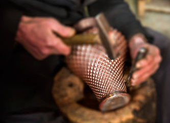 Copper master, Hands detail of craftsman at work - Gaziantep,Turkey