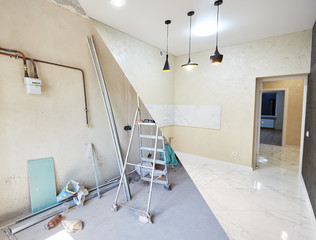 Comparative building project of a kitchen, renovation works before and after, messy unfinished room...