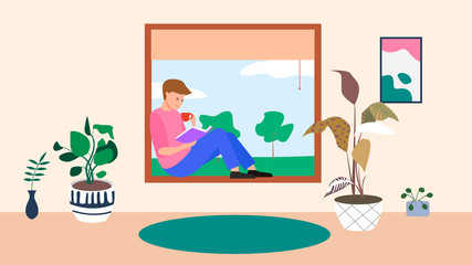 Boy reading a book in room