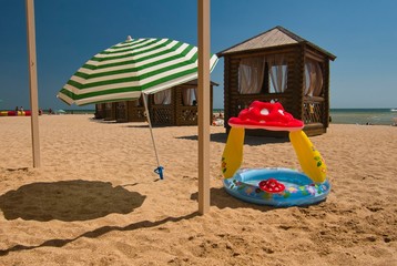 beach houses stand by the sea