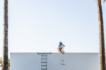 woman climbing ladder