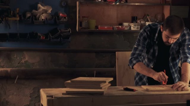 Man working with wood at workshop
