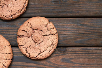 Top view of cookies on wooden background. Closeup