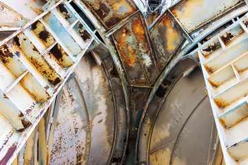 Old, abandoned concrete plant with iron rusty tanks and metal structures. The crisis, the fall of the economy, stop production capacity led to the collapse. Global catastrophe.