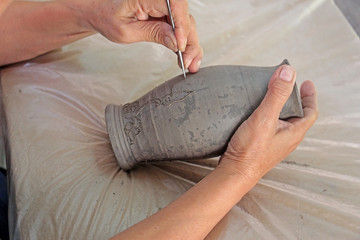 Pottery is the process of forming vessels and other objects with clay and other ceramic materials,...