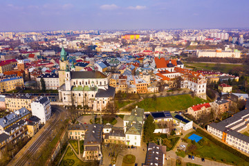 Fototapeta na wymiar Aerial view of historic center of Lublin overlooking Dominican monastery and Catholic Archcathedral in spring day, Poland