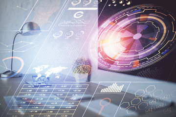 Double exposure of desktop computer and technology theme hologram. Concept of software development.