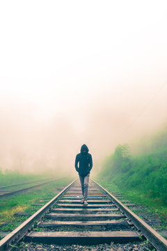 Man On Railroad Tracks