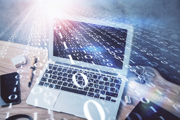 Double exposure of desktop computer and technology theme hologram. Concept of software development.