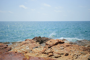 Rock with sea and sky background