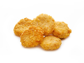 Fried crispy chicken nuggets on white background