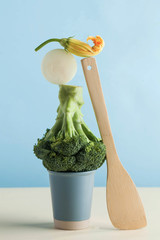 Fresh green vegetables, broccoli. The balance of the floating supply. Art concept of healthy...