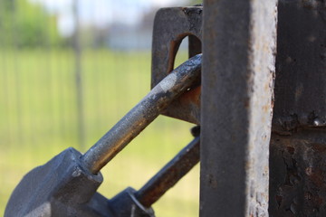 closed metal lock on iron gates, doors 