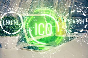 Multi exposure of blockchain theme hologram and table with computer background. Concept of bitcoin...