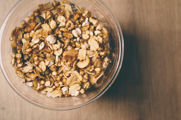 Many different raw seeds nuts on a glass pot