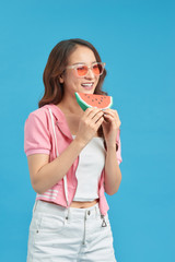 Healthy asian young woman eat watermelon,