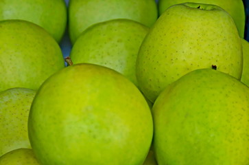 Green ripe apples on a dark background in autumn, Sofia, Bulgaria 
