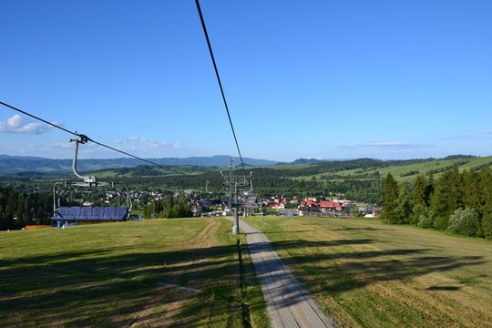Bialka Tatrzanska. View form the alpine ski lift (or chairlift) from Bialka Tarzanska to the station at the top of the mountain Kotelnica. Summer in Podhale, Poland, Europe