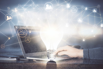 Social network theme hologram with businessman working on computer on background. Concept of world...