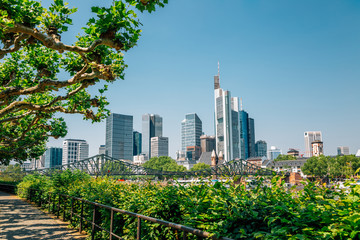 Eiserner Steg bridge and modern skyscrapers in Frankfurt, Germany