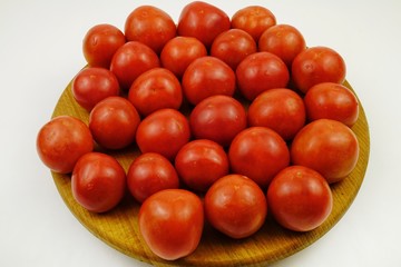 Fresh, ripe red tomatoes, background