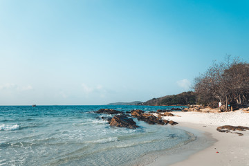 Blue sea and rocky mountains, evening bay in Krabi