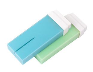 Green and blue wax in cartridge for depilation or epilation isolated on the white