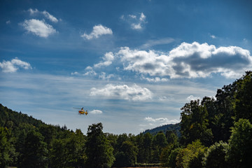 Starting helicopter in a forest 