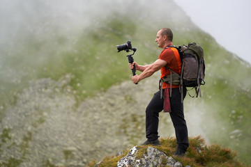 Filmmaker shooting with camera on gimbal © Xalanx