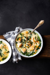 Italian wedding soup with meatballs and ptitim paste