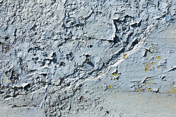 Old wall with several layers of paint