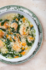 Italian wedding soup with meatballs and ptitim paste