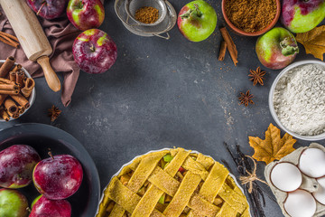Autumn apple pAutumn apple pie cooking background. Baking background with raw traditional classic...