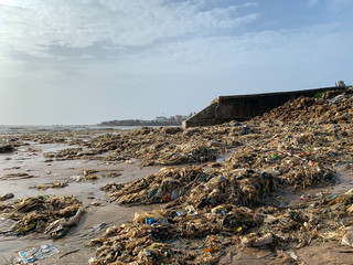 Garbages, Plastic, and wastes pollution on the Madh Island beach Mumbai