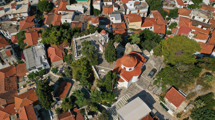 Naklejka premium Aerial drone panoramic photo of picturesque main town of Skiathos island featuring small landmark peninsula of Bourtzi, Sporades, Greece