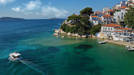 Fototapeta premium Aerial drone photo of picturesque small beach of Plakes in main village of Skiathos island, Sporades, Greece