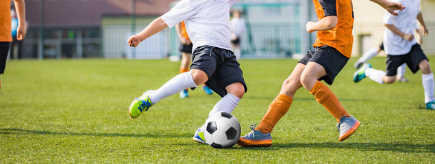 Horizontal Soccer Background. Young Football Players Kicking Ball on Soccer Field. Soccer...