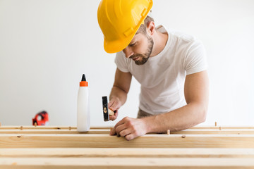 Male carpenter working on a project