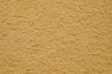 Fototapeta na wymiar wet sand of the beach texture