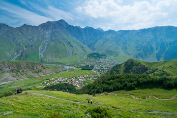 Obraz premium Stepantsminda Village, Kazbegi Reserve, Georgian Military Highway, Mtskheta-Mtianeti Region, Georgia, Middle East