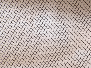 Fototapeta premium Decorative wire mesh of fence isolated on white background